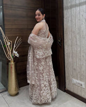 Wedding Wear Cream Color Butterfly Net Sharara Wear For Girls