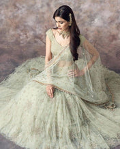 Wedding Wear Aqua Green Color Net Lehenga For Bride