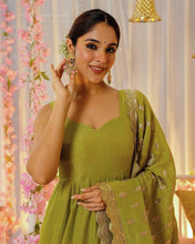 Wedding Wear Green Color Heavy Chinnon Silk Gown For Girls