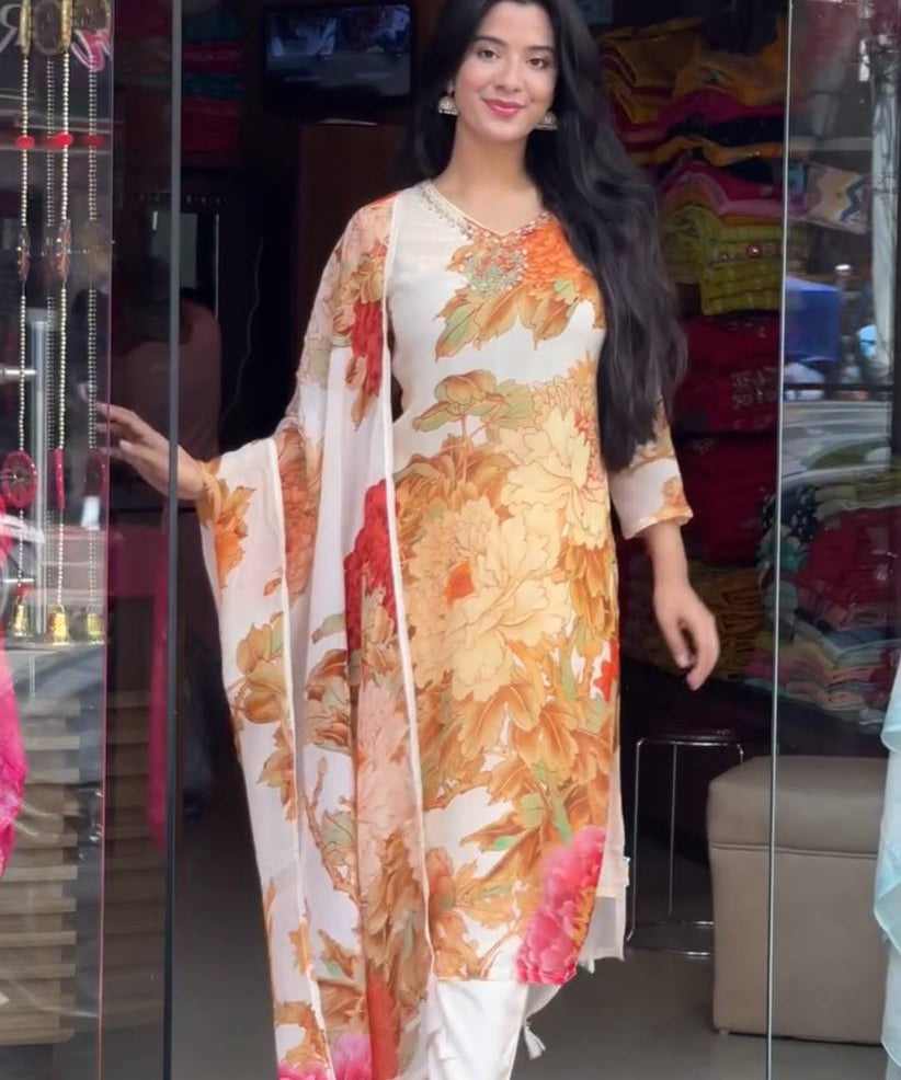 Festival_Wear_White_Color_Heavy_Faux_Georgette_Kurti_For_Girls.jpg