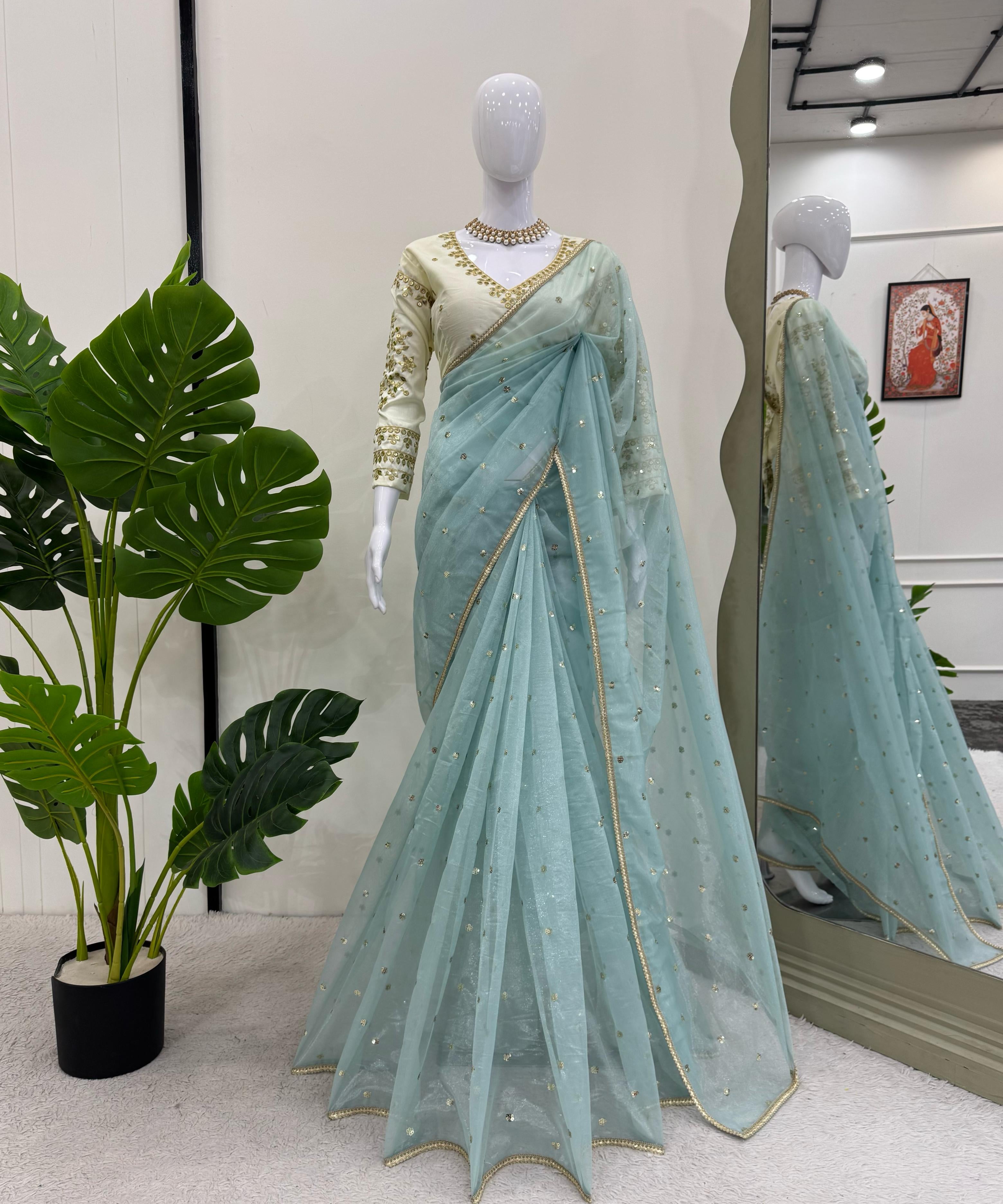 Party_Wear_Sky_Blue_Color_Havy_Twil_Net_Saree_For_Women.jpg