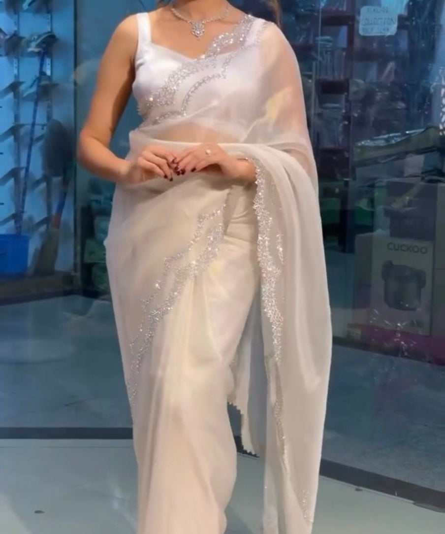 Party_Wear_White_Color_Havy_Organza_Silk_Saree_For_Girls.jpg