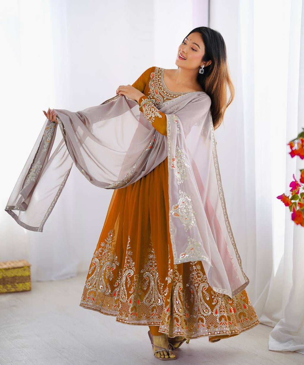 Party_Wear_Yellow_Color_Heavy_Georgette_Gown_For_Girls.jpg