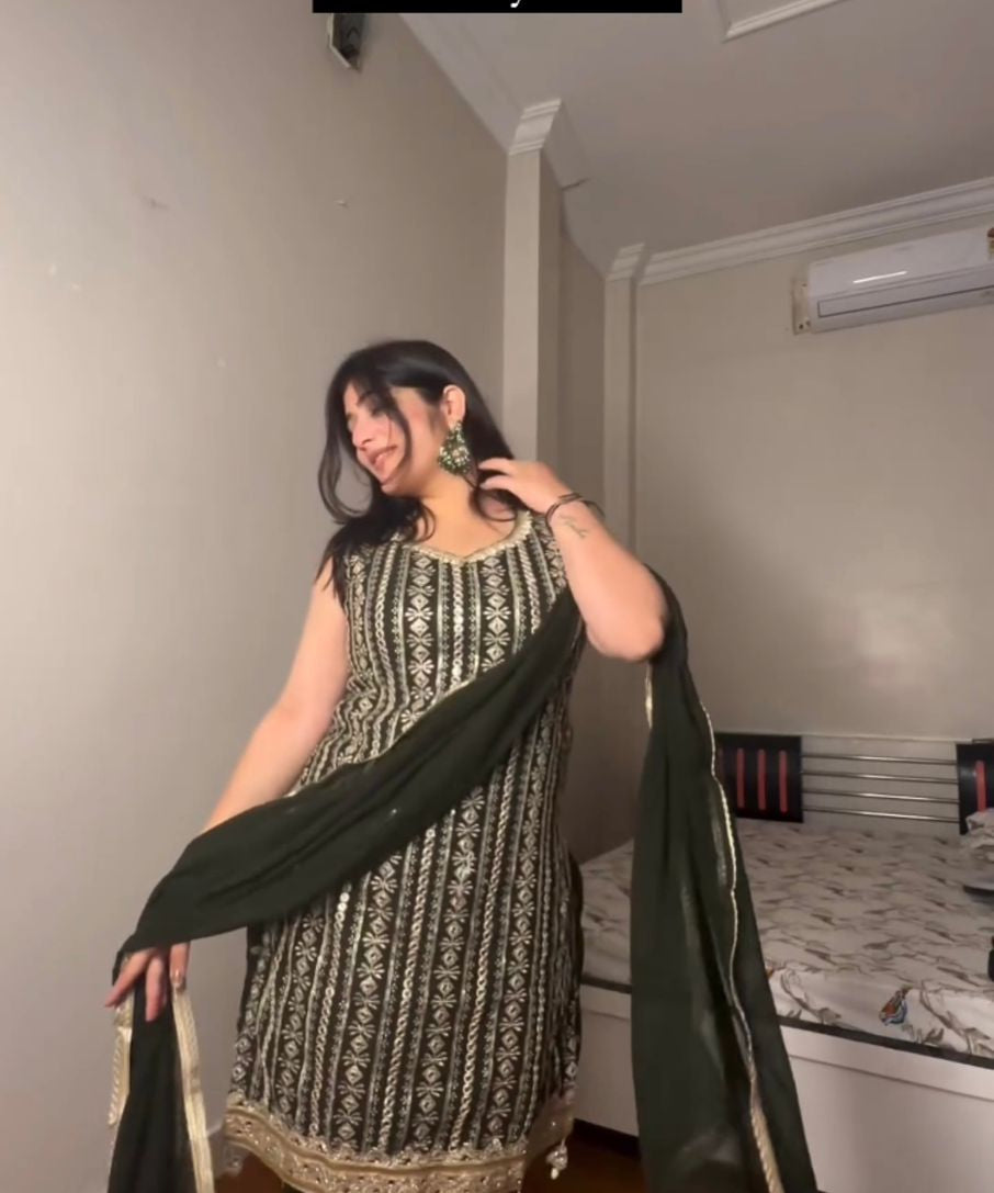 Stylish_Green_Color_Georgette_Punjabi_Suit_For_Girls.jpg