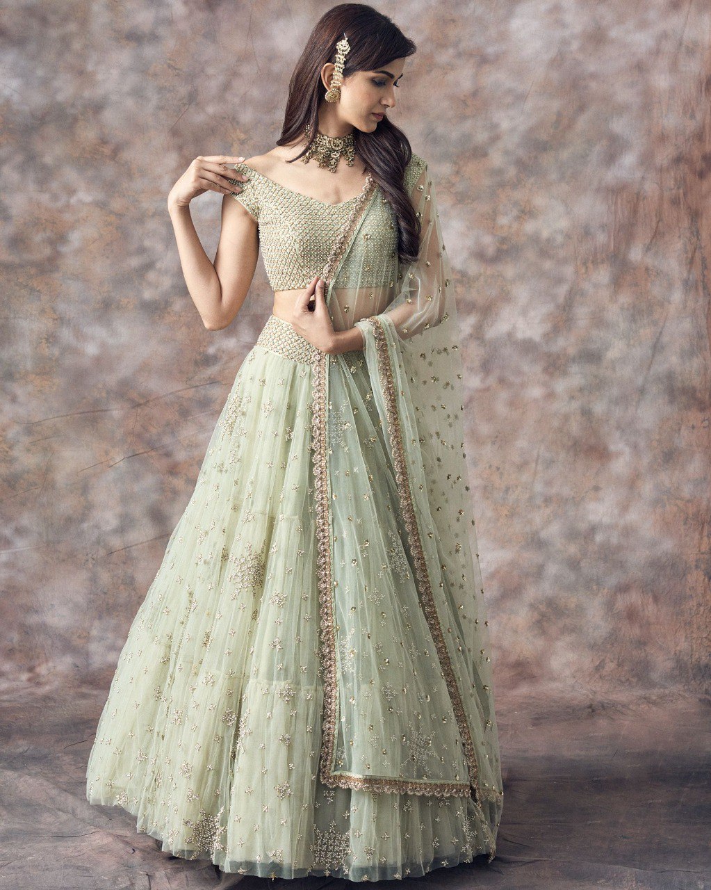 Wedding Wear Aqua Green Color Net Lehenga For Bride