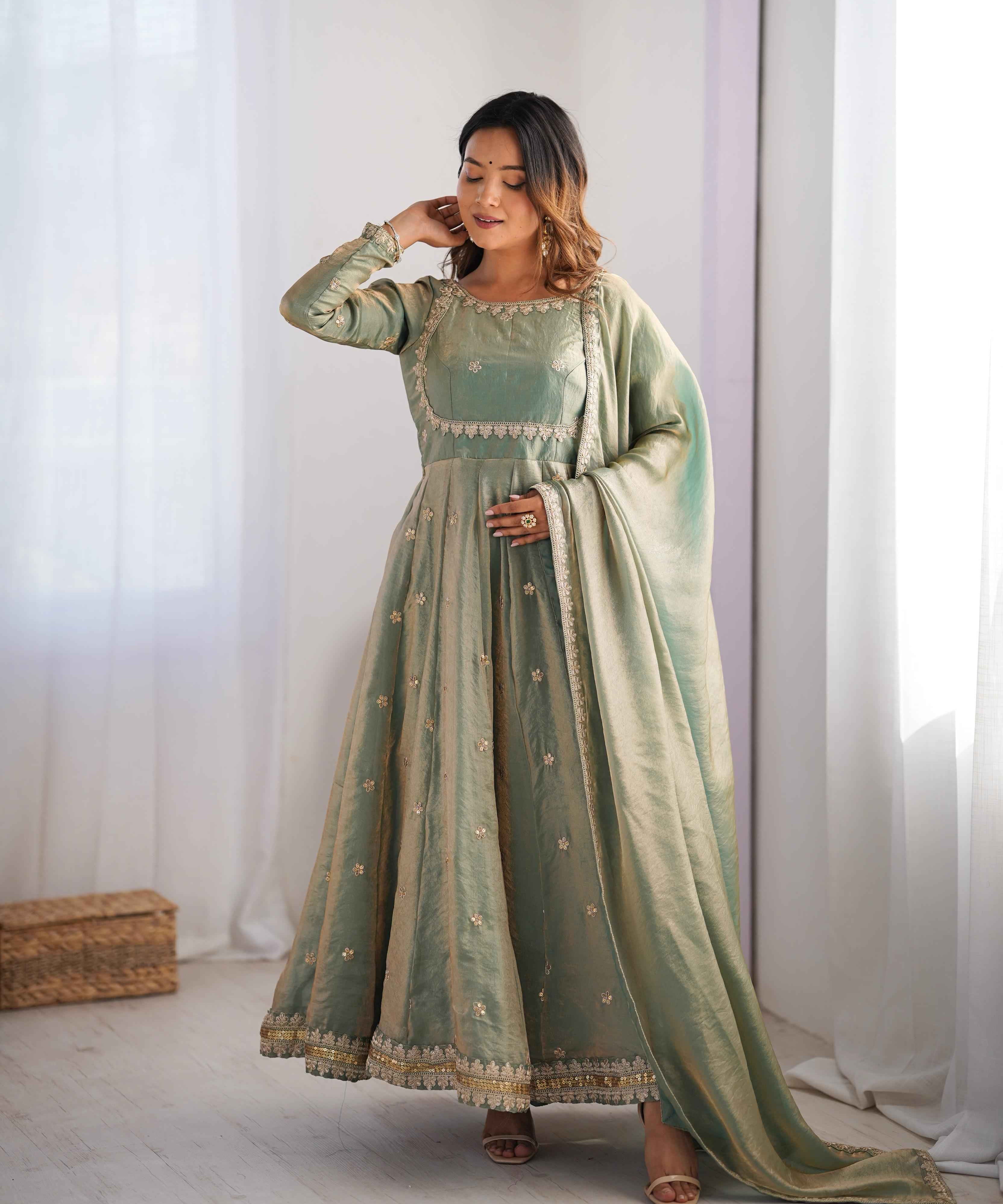 Wedding Wear Light Green Color Fandy Silk Gown For Girls