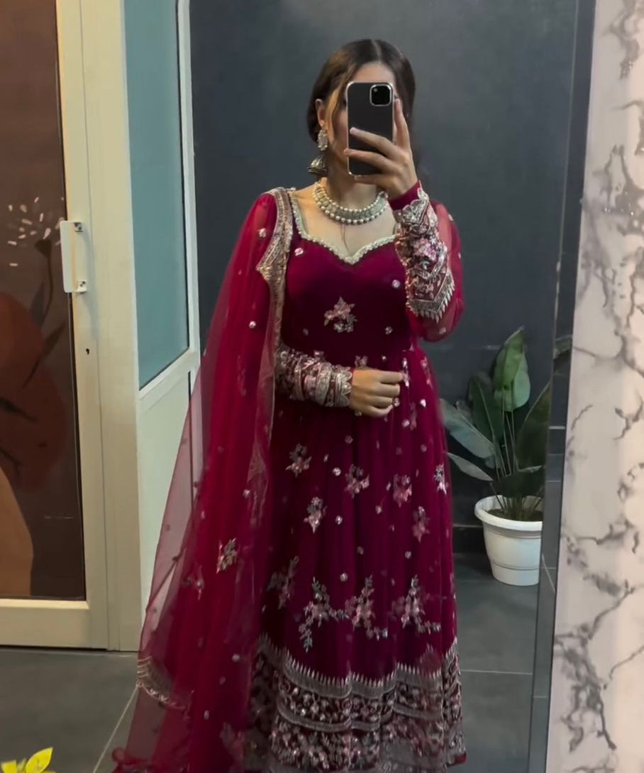 Wedding_Wear_Maroon_Color_Net_Gown_For_Girls.jpg