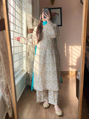 Pastel Beige Floral Cotton Kurta Set with Teal Dupatta