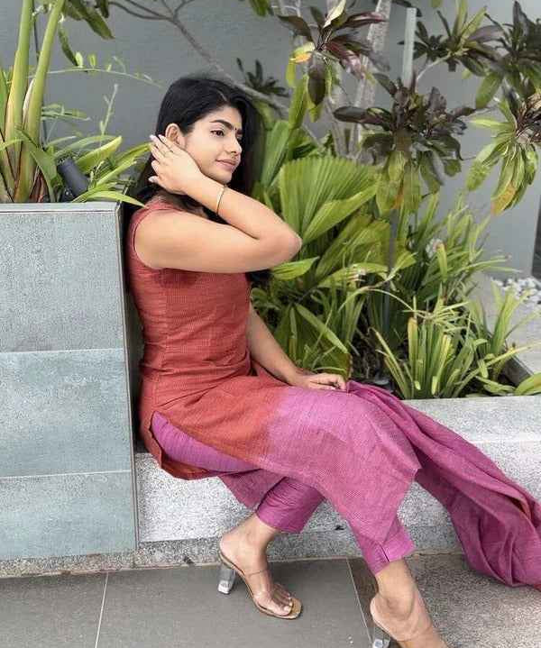 Lady In Pink This jute silk woven salwar suit